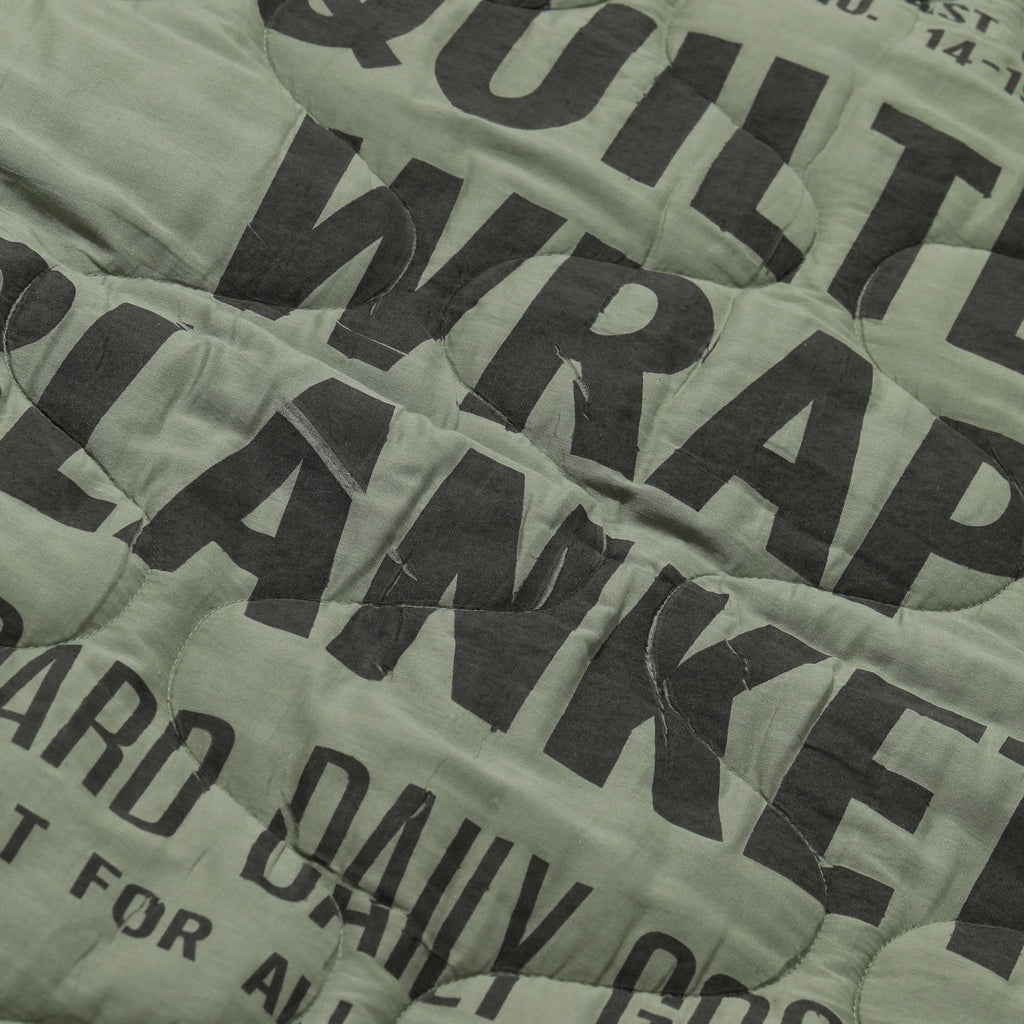 MADNESS x PUEBCO QUILTED WRAP BLANKET