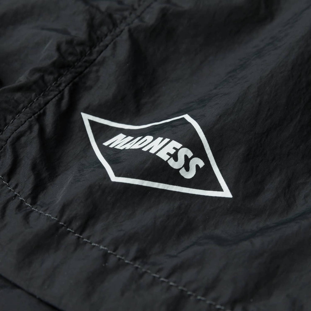 MADNESS LOGO NYLON SHORTS