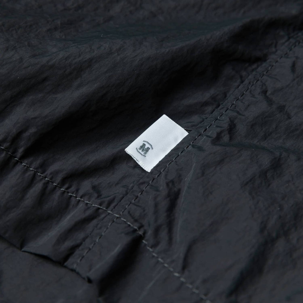 MADNESS LOGO NYLON SHORTS