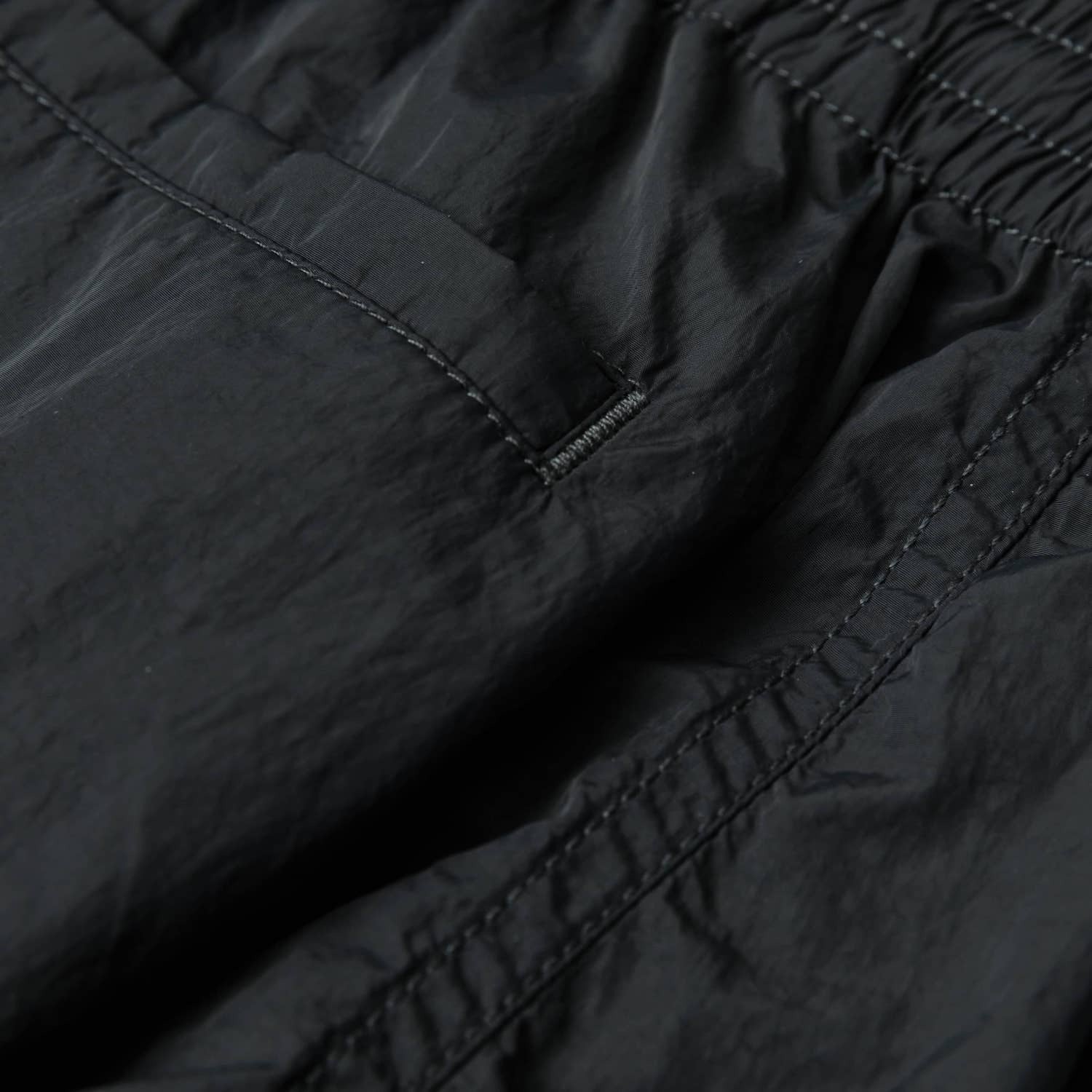 MADNESS LOGO NYLON SHORTS
