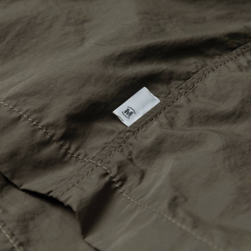 MADNESS LOGO NYLON SHORTS