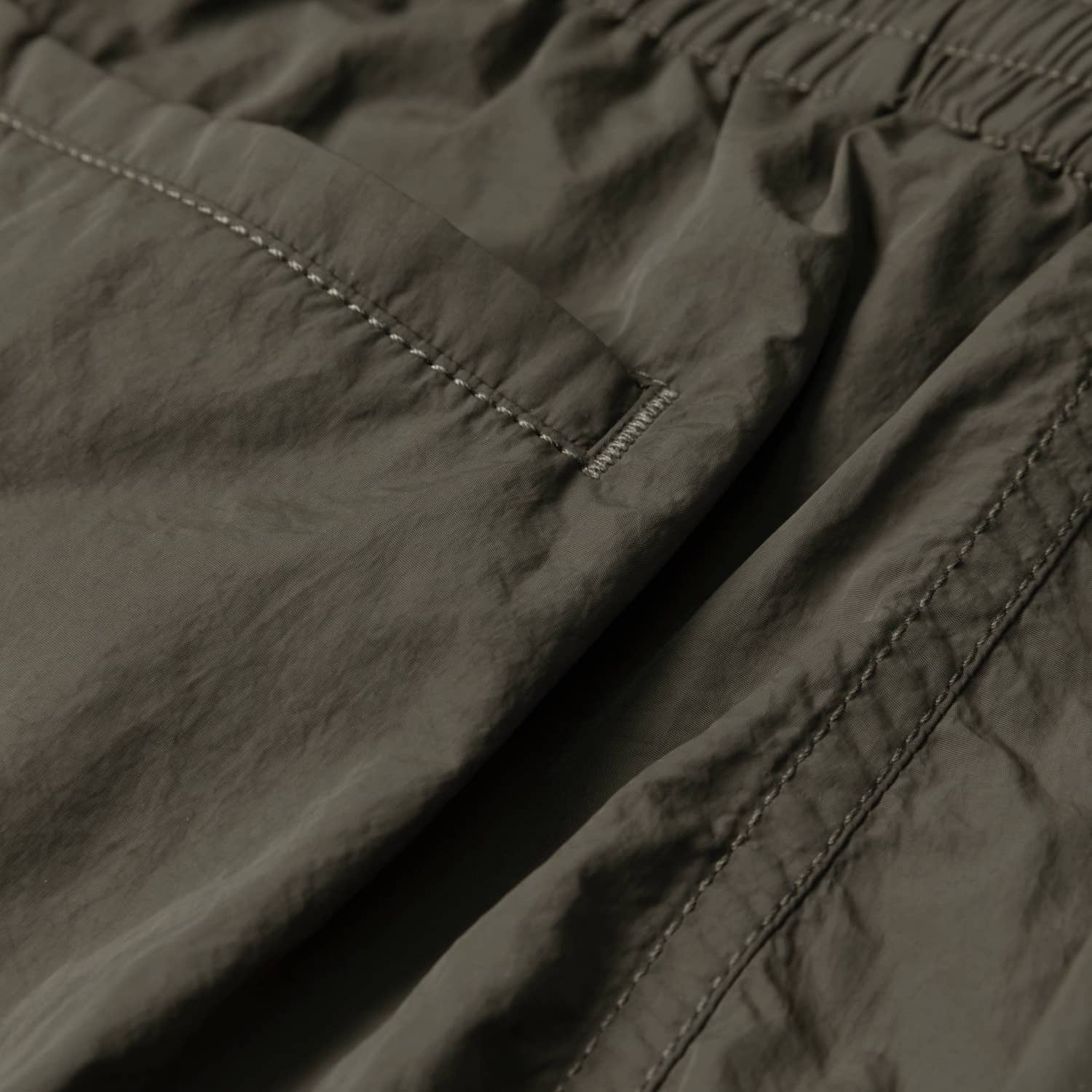 MADNESS LOGO NYLON SHORTS