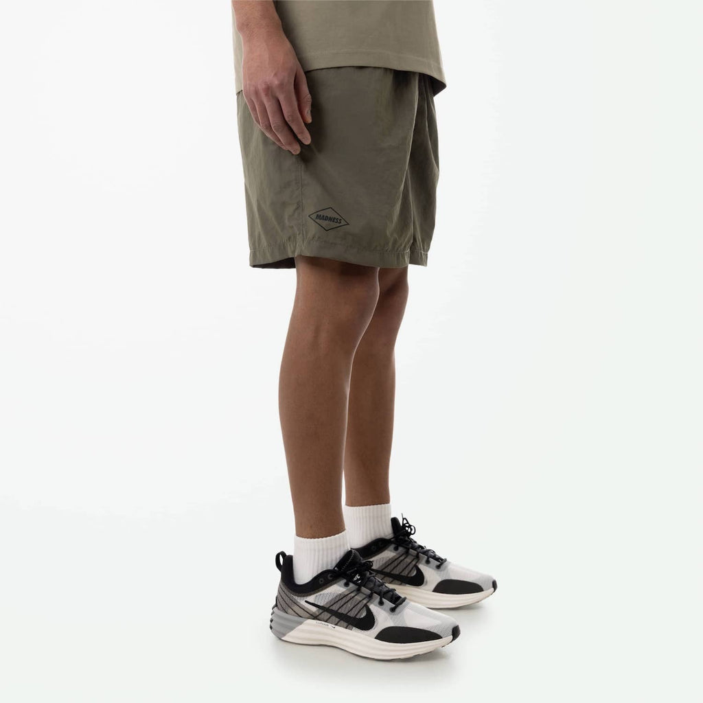 MADNESS LOGO NYLON SHORTS
