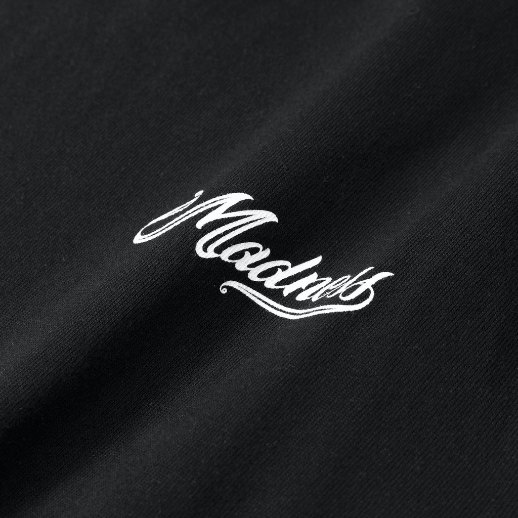 MADNESS BADGE (L) UNIFORM T-SHIRT