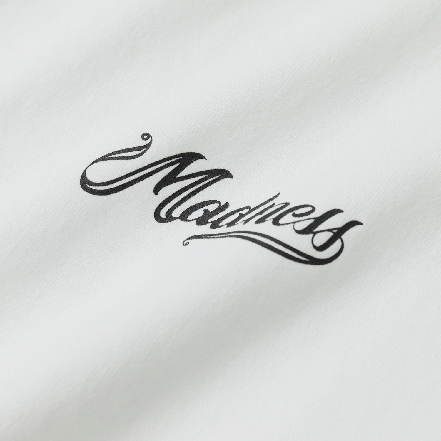 MADNESS BADGE (L) UNIFORM T-SHIRT